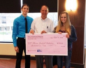 Pictured from left English 2367.01 students Nicholas Sampsel and Kaylee Johnson with Executive Director for Marion Goodwill Industries Robert Jordan and $500 Pay It Forward donation check.