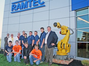 Pictured, front row: Zach Caldwell, Jeffrey Martin, Scott Gould and Tyler Scott Ellis. Back row: Adult Director Richard George, FANUC Instructor Mark Edington, TRCC Advanced Manufacturing & Engineering Instructor Ritch Ramey, Hayden Behrens, David Moser, Casey Ogan, Austin Guthrie, Mason Dancz, Superintendent Chuck Speelman.