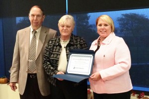 Bob Jordan, Marion Goodwill President & CEO, presents the Community Partner Award to Deb Murphy & Tami Galloway of Marion Technical College.