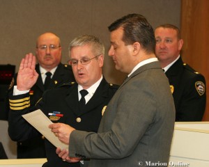 Jeff Clewell is sworn in by Mayor Scott Schertzer has a major with the Marion Police Department.