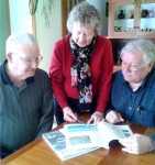 Sandra Novatny, public boating class chair, reviews lesson plans with instructors Jim Ruth (left) and Don Novatny (right).