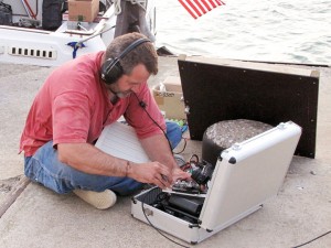 Gregg Stephens last year on the Firelands Winery dock with his homemade solar panel setup.