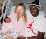 Karly Griffin (mother), Dathan Davis (father) and their New Year’s Baby, Zharia Isabelle
