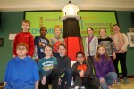 Benjamin Harrison Elementary’s student leadership team pose with the lighthouse given to the school to signify its status as a The Leader in Me Lighthouse School