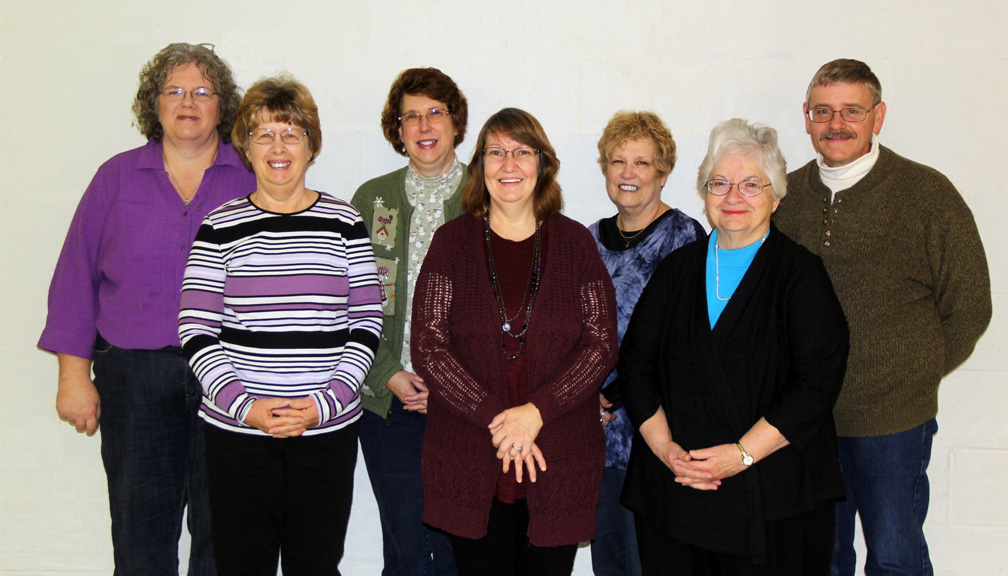 From left to right front row is Pam Schweinfurth Secretary, Lisa Carlyle Vice-President, Cheryl Culver Trustee.  Back Row is Becky Oldham Trustee, Ronda Snyder President, Paula Burns Treasurer, and Frank Snyder Corresponding Secretary.  Not pictured Mary Lee Trustee.