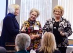 2017 Athena recipient Pam Hall receiving the Athena statue from program chair Diane Glassmeyer and WBC president Terri Martin.