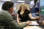 GEAR UP at Marion City Schools advisor Jane Arnold, left, talks to Marion Harding High School senior Shiniya Mallory about her college plans. Ohio Superintendent of Public Instruction Paolo DeMaria will tour GEAR UP when he visits Harding and Rushmore Academy on Friday.