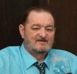 Ronald E. “Ron” Blair