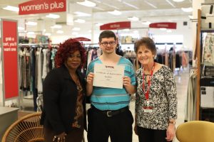 Mason with TJ Maxx manager Mary (left) and coworker Nancy.