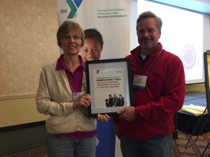 YMCA Executive Director, Theresa Lubke, accepted the award from the Ohio Alliance of YMCA’s board chair, Brad Toft, at the Alliance’s annual Chief Executive Conference earlier in October. 