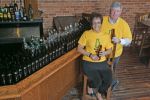 Photo: An estimated 1,000 tons of glass that used to go to landfills will now be recycled through the Glass Act, a unique bar bottle recycling program created and organized by Angela Carbetta (L), director of Marion County Recycling & Litter Prevention, and funded in part by matching grant sponsor Ohio Galvanizing Corporation, represented by Frank Bellamy (R), vice president.